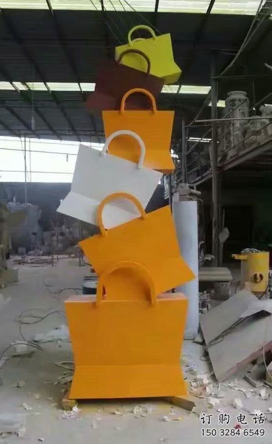 园林提包雕塑厂家 烤漆小品 中式不锈钢提包雕塑制作 园林提包雕塑厂家 烤漆小品 中式不锈钢提包雕塑制作