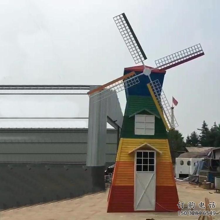彩绘大风车雕塑厂家 抽象摆件 街头大风车雕塑厂