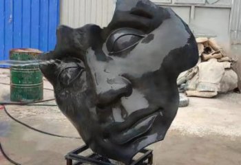 喷漆人脸雕塑厂家 中式小品 草地不锈钢人脸雕塑厂