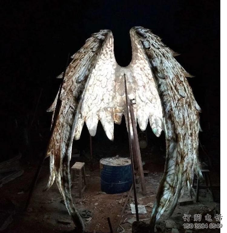 城市翅膀雕塑厂家,网格灯光雕塑,古铜效果 城市翅膀雕塑厂家,网格灯光雕塑,古铜效果