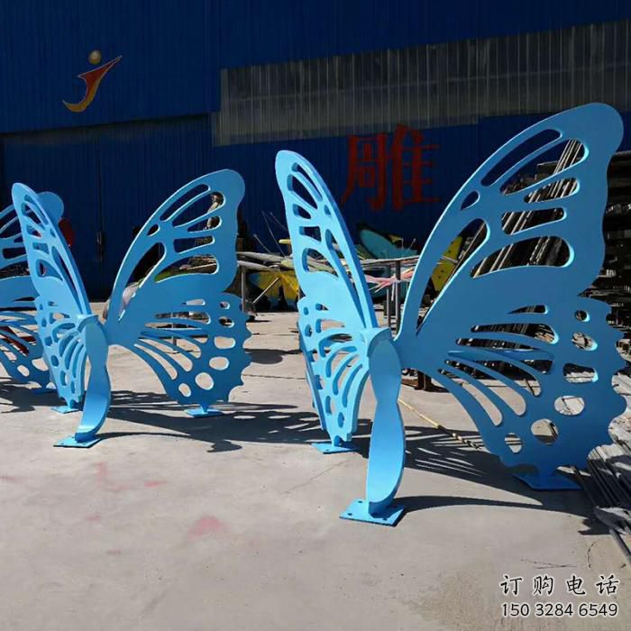 现代艺术美陈蝴蝶坐凳雕塑,镂空工艺制作 现代艺术美陈蝴蝶坐凳雕塑,镂空工艺制作