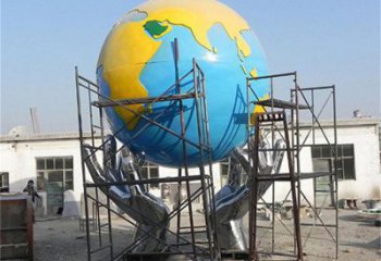 地球仪雕塑制作，村标概念，锻钢手托地球仪雕塑厂家
