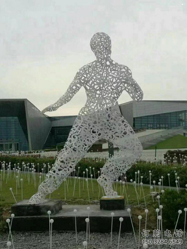 镂空李小龙雕塑制造，街景小品，铁艺人物雕塑优价