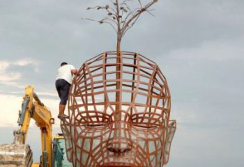 铁艺人头像雕塑制造商，室外软装，镂空人头像雕塑制作承接