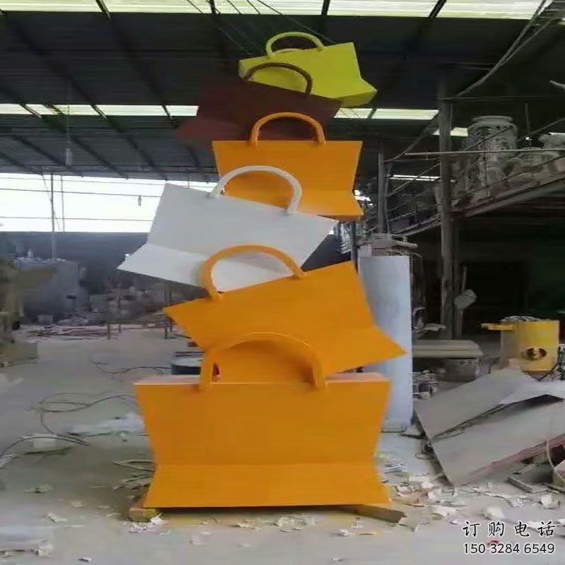 镇江烤漆挎包雕塑制造商,室外软装,景观挎包雕塑制作 镇江烤漆挎包雕塑制造商,室外软装,景观挎包雕塑制作